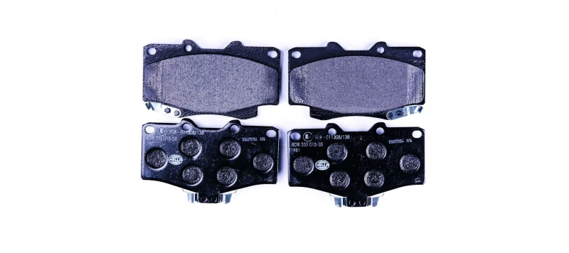 Image of HELLA Brake pad set HELLA 8DB 355 015-351