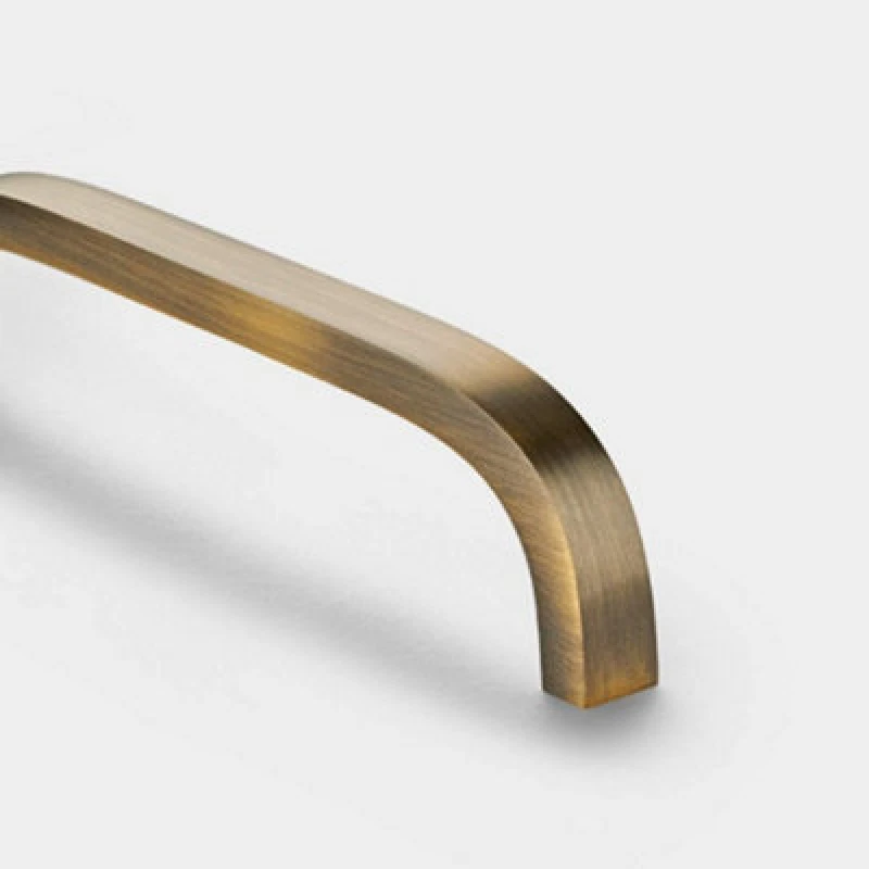 Image of Pushka Home Brass Curved Bar Handle With Hole Centre 448mm - Antique Gold