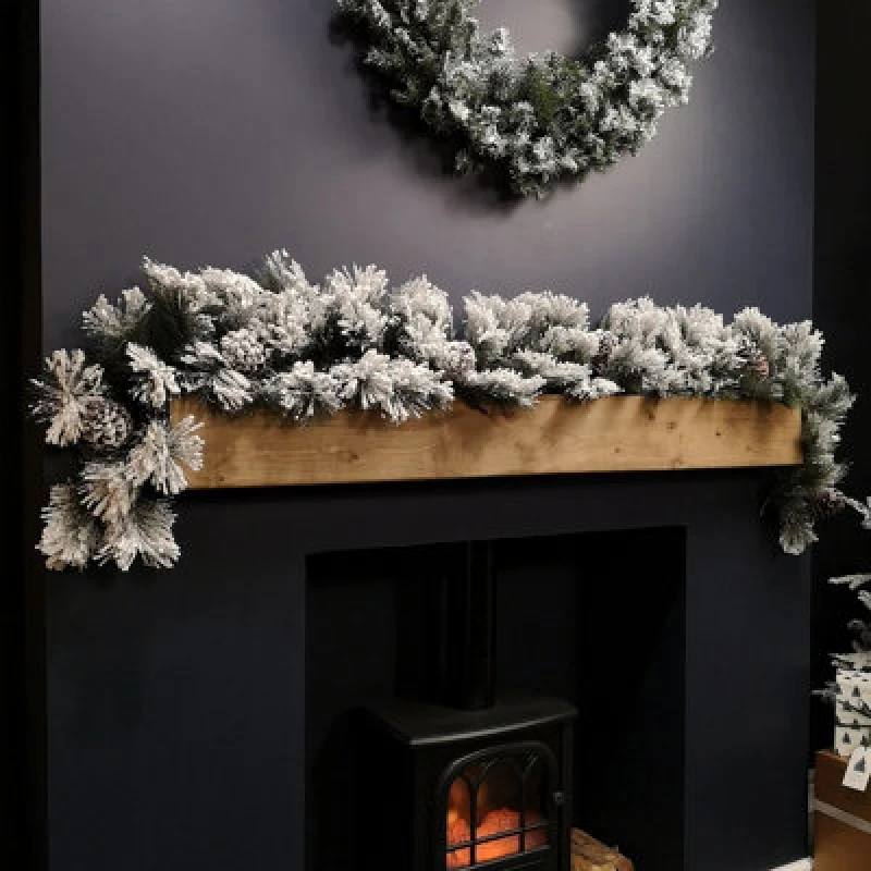 Image of Samuel Alexander 6ft (1.8M) Premier Christmas Snow Flocked Green Garland With Pine Cones