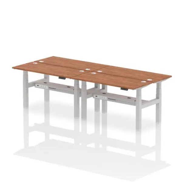 Image of Air Air Back-to-Back 1400 x 600mm Height Adjustable 4 Person Bench Desk Walnut Top with Cable Ports Silver Frame HASCP4P14600WNTS