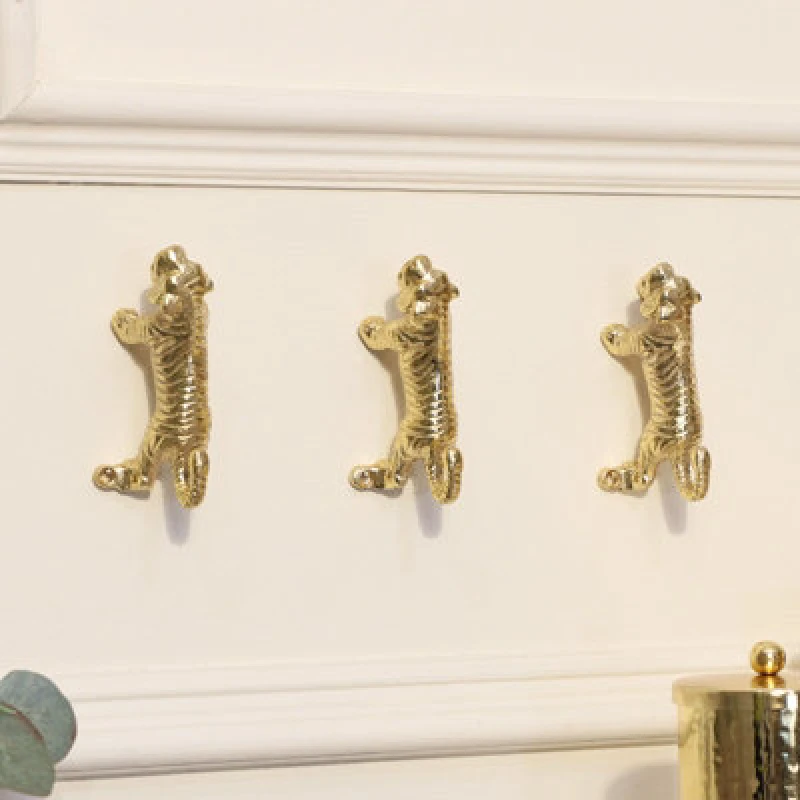 Image of Melody Maison Set Of 3 Gold Tiger Wall Hooks Metallic Gold