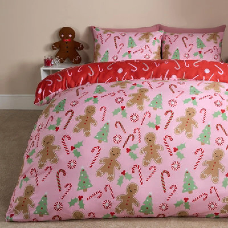 Image of OHS OHS Gingerbread Man Reversible Bedding Set Duvet Cover with Pillowcase in Pink Size: Single Pink Single Unisex 5027434188482