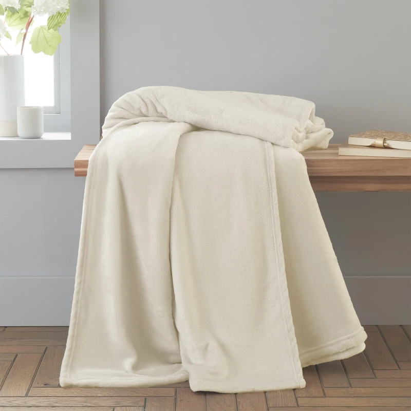 Image of Catherine Lansfield Catherine Lansfield 'Raschel Velvet Touch' Blanket Throw in Cream Size: 130cm x 170cm Cream 130cm x 170cm Unisex 5057681155555