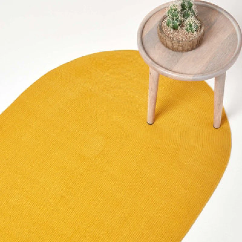 Image of Homescapes Handmade Woven Braided Oval Rug Mustard