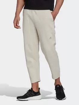 Image of adidas Studio Lounge Fleece 7/8 Joggers, Beige Size XS Men