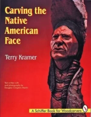 Image of Carving the native American face by Terry Kramer