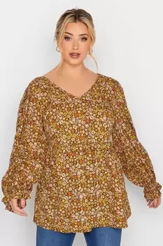 Image of Floral Peplum V-Neck Swing Top