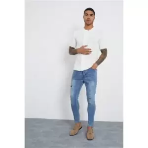 image of I Saw It First Mid Wash Rip & Repair Patch Skinny Jeans - Blue