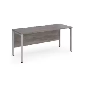 Image of Maestro 25 straight desk 1600mm x 600mm - silver bench leg frame and grey oak top