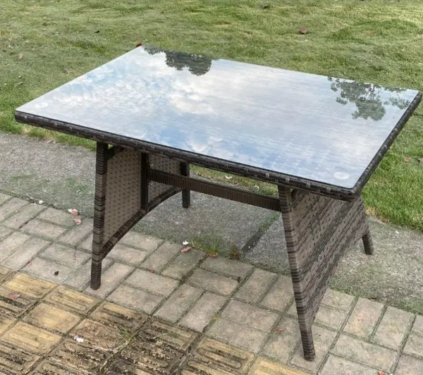 Image of Fimous Outdoor Dark Grey PE Rattan Dining Table with Clear Tempered Glass