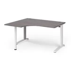 image of TR10 left hand ergonomic desk 1400mm - white frame and grey oak top