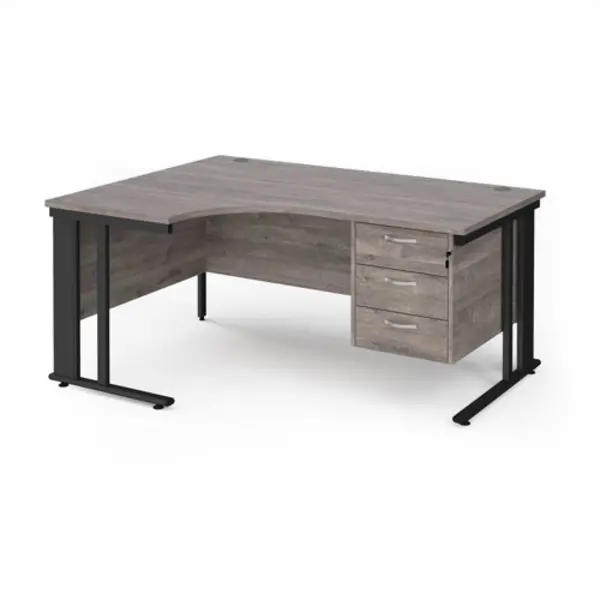 Image of Maestro 25 left hand ergonomic desk 1600mm wide with 3 drawer pedestal - Black cable managed leg frame, grey oak top