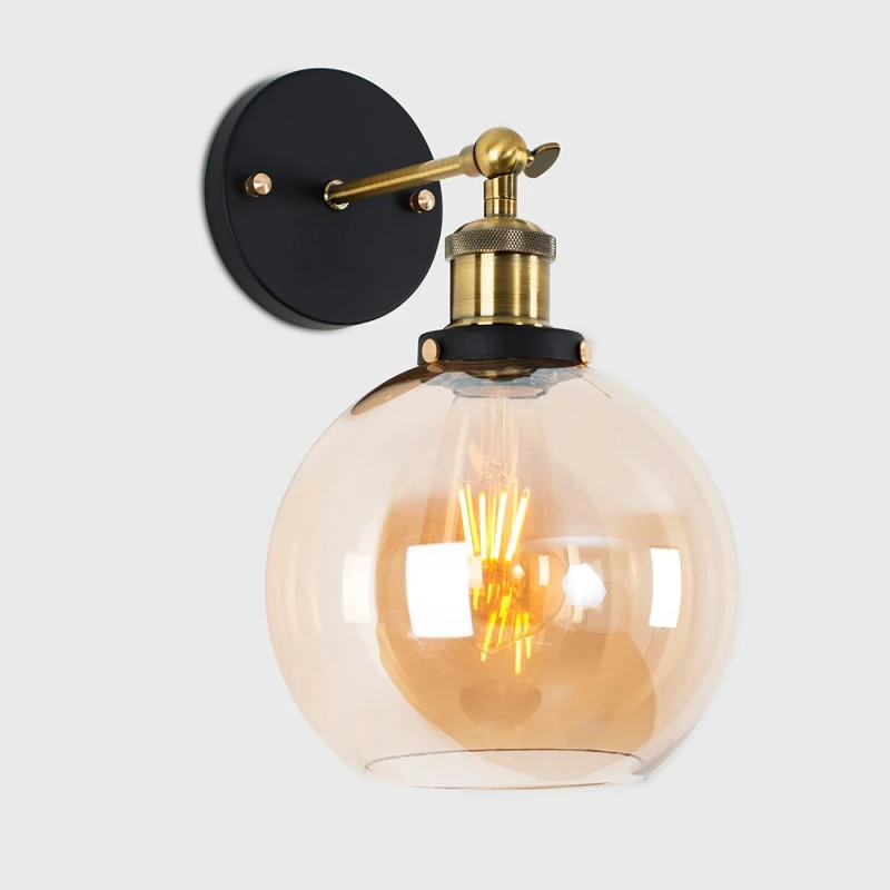 Image of ValueLights Sheridan Pair of Industrial Clear Glass Bowl Gold Trim Black Wall Lights and LED Bulbs Orange