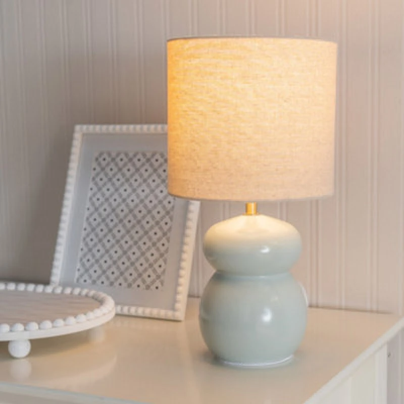 Image of ValueLights ValueLights Kendal Natural Linen Drum Shade Glazed Ceramic Table Lamp with LED Bulb in Pale Blue Pale Blue One Size Unisex 5059406066139