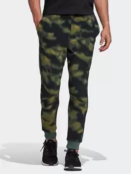 Image of adidas Polar Fleece Nature Print Joggers, Green Size M Men
