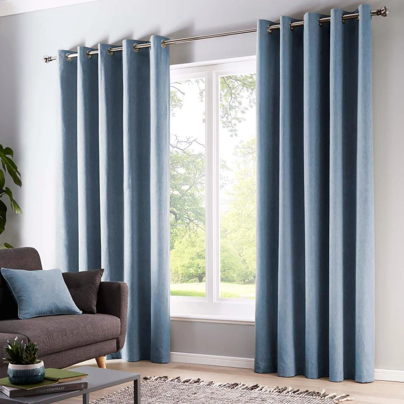 Image of Fusion 'Sorbonne' 100% Cotton Light Filtering Plain Dyed Eyelet Curtains Light Blue
