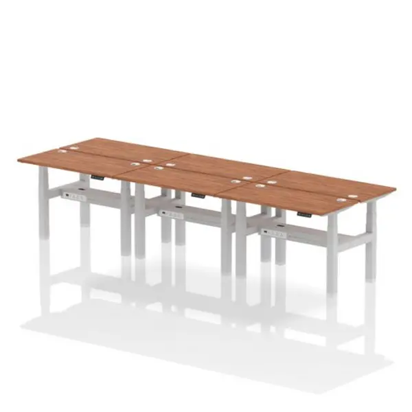 Image of Air Air Back-to-Back 1200 x 600mm Height Adjustable 6 Person Bench Desk Walnut Top with Cable Ports Silver Frame HASCP6P12600WNTS