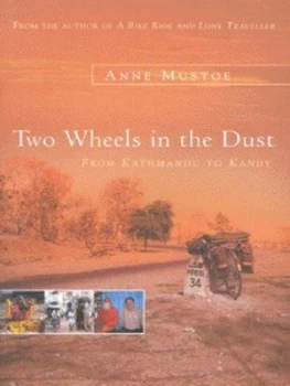 Image of Two wheels in the dust by Anne Mustoe