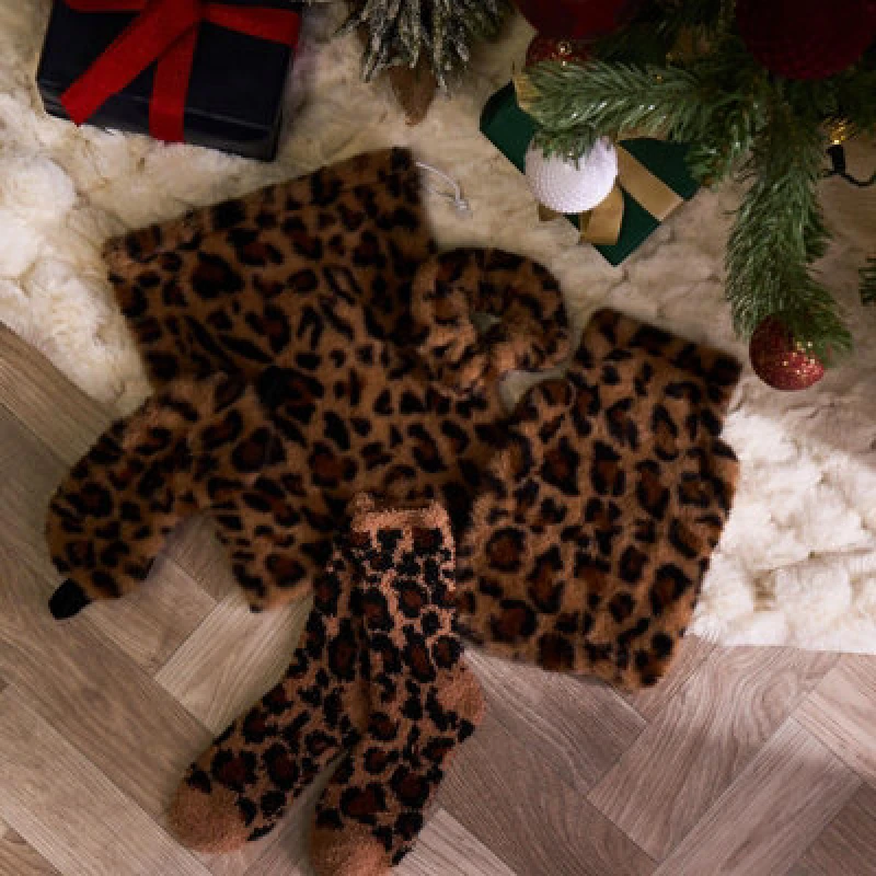 Image of OHS OHS Print Hot Water Bottle Gift Set Includes Socks Eye Mask Scrunchie in Brown Brown One Size Unisex 5027434220243