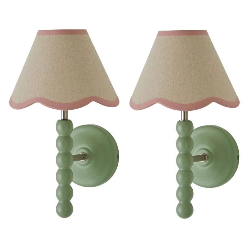 Image of ValueLights Bobbins Pair of Green Wall Lights & Linen Pastel Trim Lamp Shades in Pale Pink Pale Pink Unisex