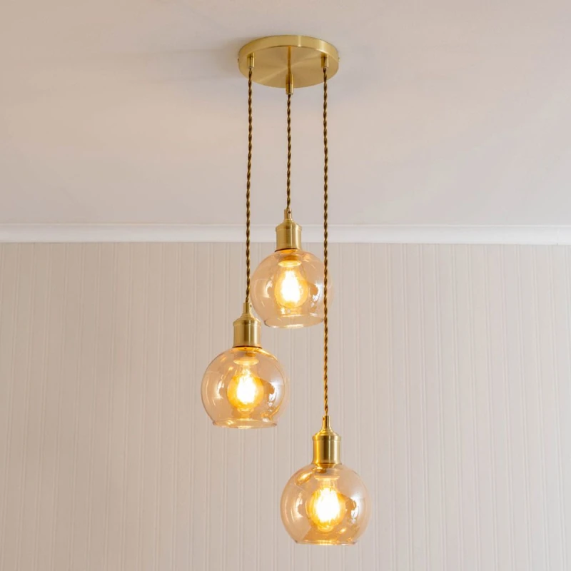 Image of ValueLights ValueLights Bellamy Amber Glass Globe 3 Drop Cluster Gold Ceiling Pendant Light with Bulbs Amber One Size Unisex 5059406063510