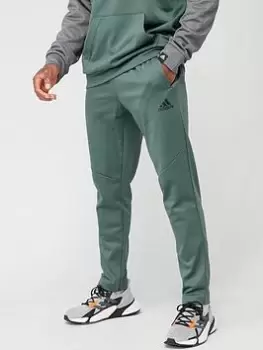 Image of adidas Train Game & Go Badge of Sport Joggers - Green Size M Men