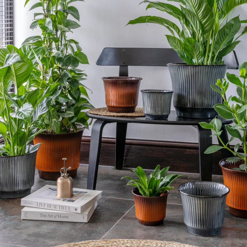 Image of Ivyline Jasper Ribbed Tapered Planter (Set Of 4) - Metal - Burnt Orange