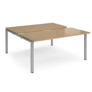 Image of Bench Desk 2 Person Starter Rectangular Desks 1600mm With Sliding Tops Oak Tops With Silver Frames 1600mm Depth Adapt
