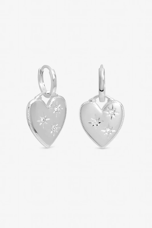 Image of Inicio Womens Sterling Silver Plated Celestial Heart Charm Huggie Hoops - Gift Pouch Silver Female One Size