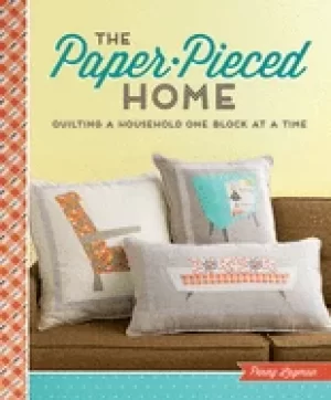 Image of paper pieced home quilting a household one block at a time