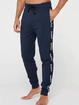 Image of HUGO Sporty Tape Logo Lounge Pant - Dark Blue, Dark Blue, Size 2XL, Men