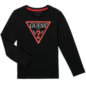 Image of Guess SOLEDAD boys's in Black. Sizes available:2 ans,3 ans,4 ans,5 ans,6 ans
