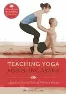 Image of teaching yoga adjusting asana
