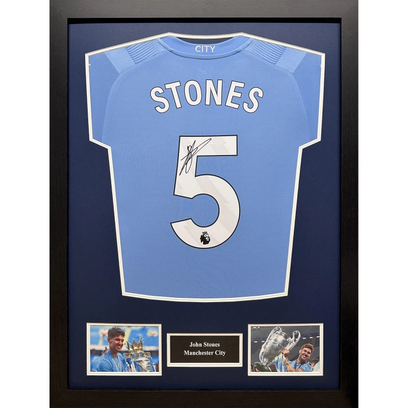 Image of AllStarSignings Ltd John Stones signed & framed Manchester City shirt Blue unisex One Size