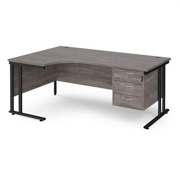 Image of Maestro 25 left hand ergonomic desk 1800mm wide with 3 drawer pedestal - Black cantilever leg frame, grey oak top