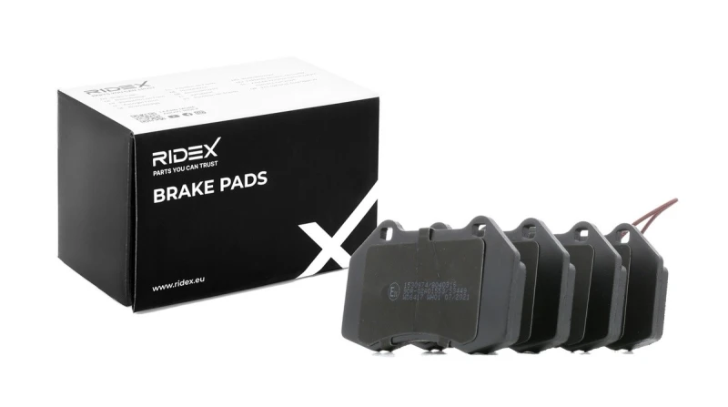 Image of RIDEX 402B0540 Brake pad set Front Axle, with integrated wear sensor, with anti-squeak plate, Axle Vers.: Front Low-Metallic Brake Pad Set,disc brake