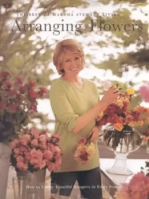 Image of Arranging flowers by Martha Stewart Living magazine