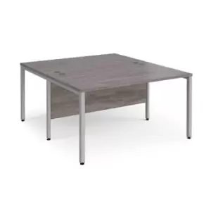 image of Maestro 25 back to back straight desks 1400mm x 1600mm - silver bench leg frame and grey oak top