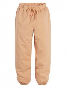Image of Levis Jersey Sweatpants - Orange Size XS Women