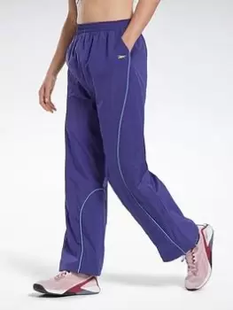 Image of Reebok Les Mills Woven Joggers - Purple, Purple, Size S, Women