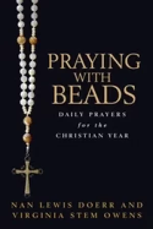 Image of praying with beads daily prayers for the christian year