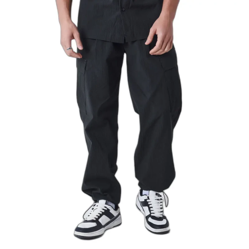 Image of Project X Paris Wrinkled effect trousers with pockets Project X Paris Noir Male S