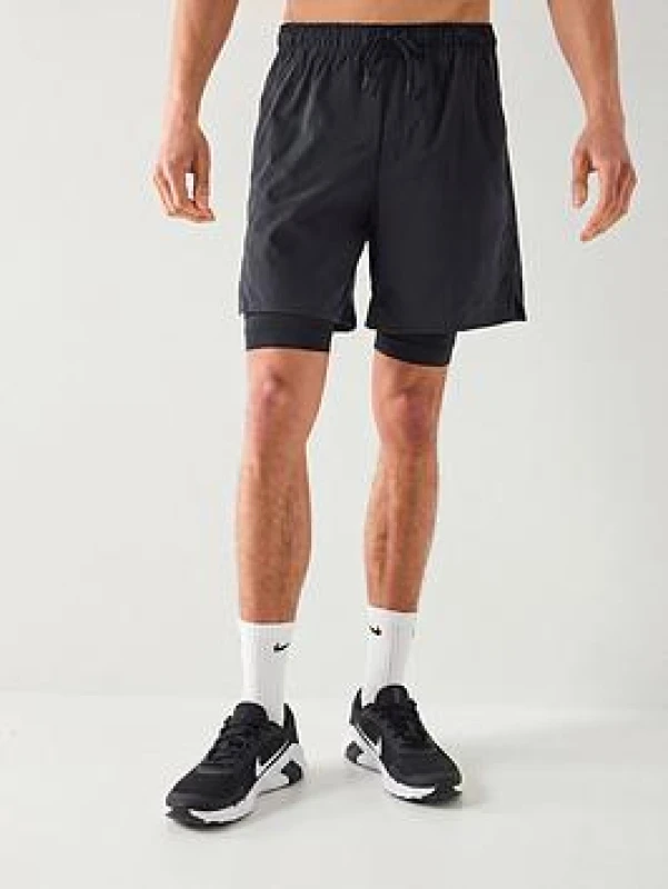 Image of Nike Dri-FIT Unlimited Mens 7 2-in-1 Woven Fitness Shorts - Black Male L
