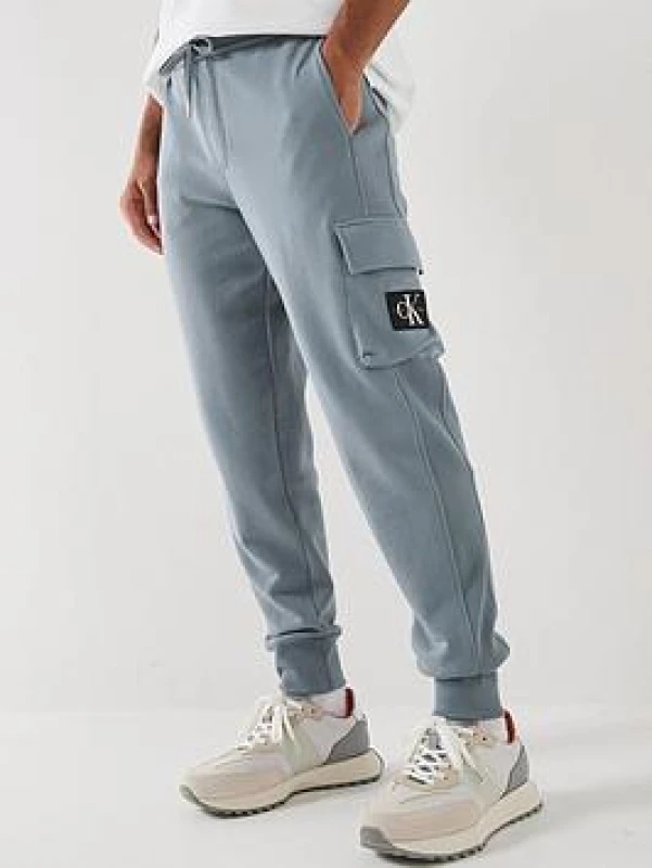 Image of Calvin Klein Jeans Logo-Patch Track Pants - Grey Male S
