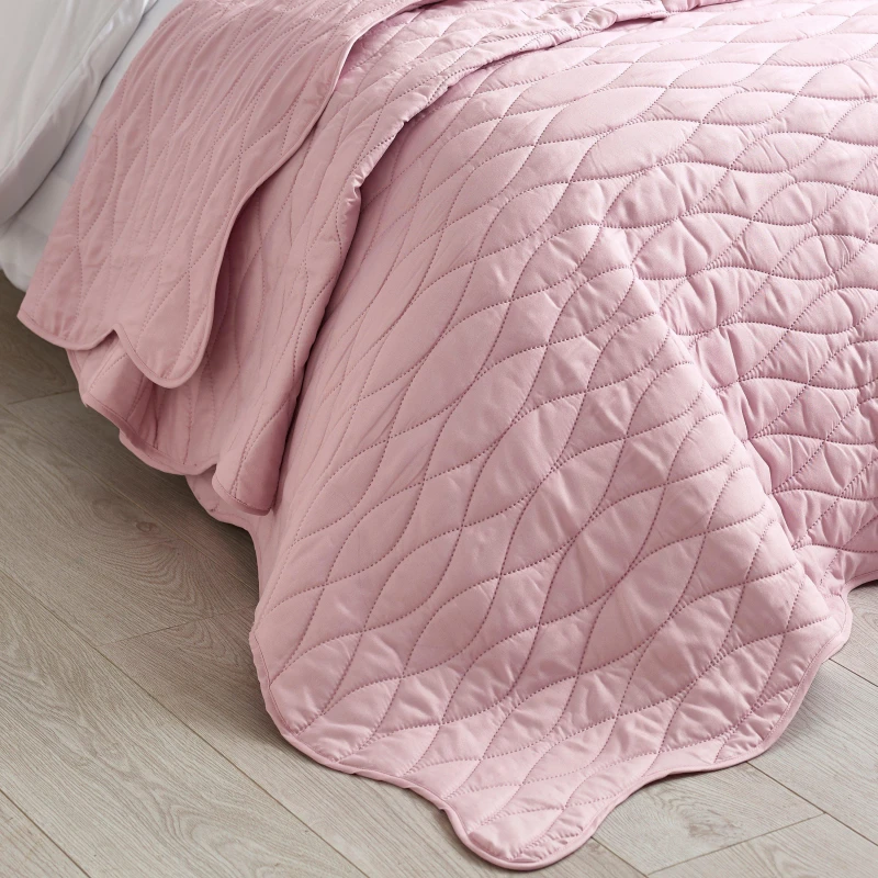Image of Catherine Lansfield Scallop Waves 240cm x 260cm Quilted Bedspread Pink