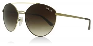 image of Vogue VO4023S Sunglasses Matte Brown / Gold 502113 56mm