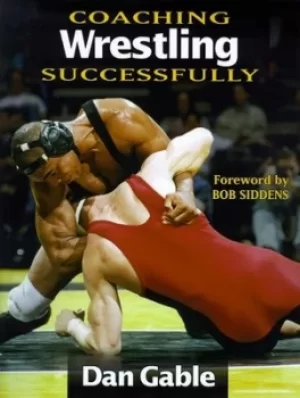 Image of Coaching wrestling successfully by Dan Gable