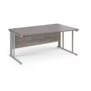 image of Maestro 25 right hand wave desk 1600mm wide - silver cable managed leg frame and grey oak top