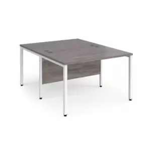 image of Maestro 25 back to back straight desks 1200mm x 1600mm - white bench leg frame and grey oak top