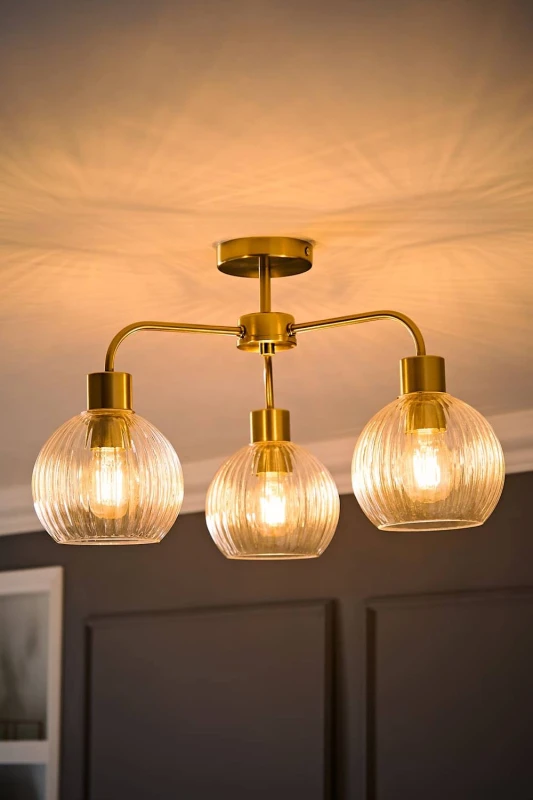 Image of ValueLights Maddison Clear Ribbed Glass Globe 3 Arm Ceiling Light & Filament Bulbs in Gold Gold Unisex